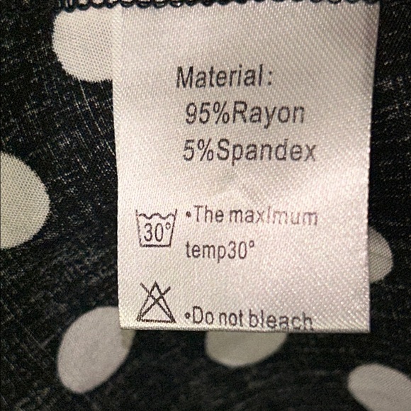 Black and White Sleeveless Maxi Dress with Ruffle Hem and V-Neckline - Picture 11 of 12